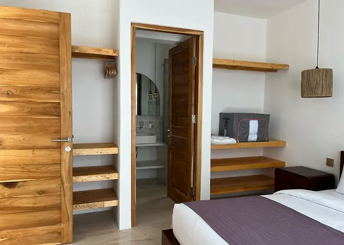 Ferienhaus Cozy 1br Wood Furnished In Nelayan Reef
